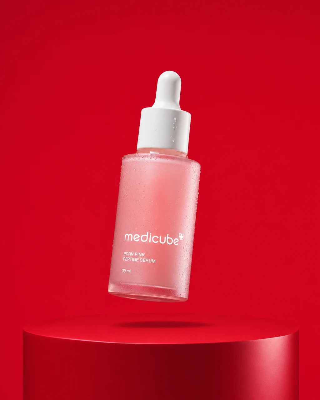 Producto sobre cereza · concepto Medicube generado con IA